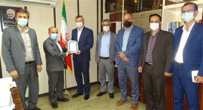 سند افتخار مشارکت کارکنان اداره کل اموراقتصادی و دارایی مازندران در ساخت صحن مبارک حضرت زهرا(س)در نجف اشرف